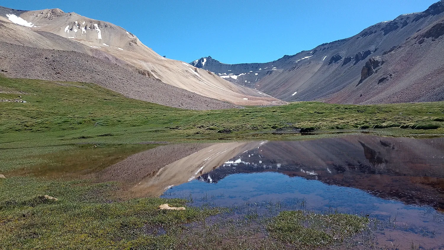 Las Estrellas project area in the northern Malargüe District, with copper-mineralised outcrops along the andesitic-basaltic volcanic cover